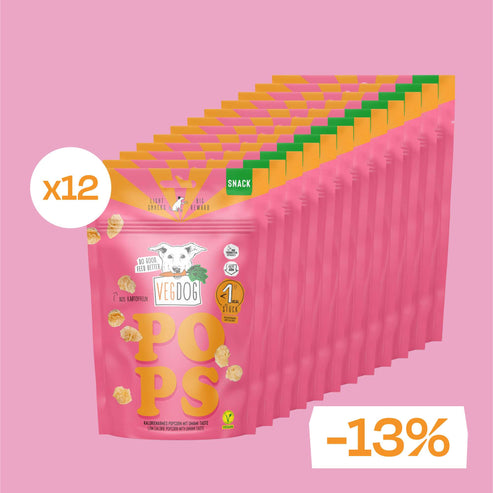 a group of pink bags with yellow and orange labels